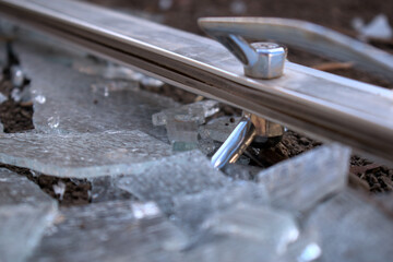 shattered glass close up with metal frame
