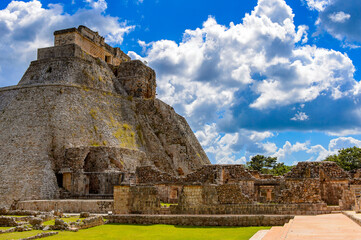 Fototapeta na wymiar Pyramid of the Magician, a Mesoamerican step pyramid, Uxmal, an ancient Maya city of the classical period. UNESCO World Heritage site