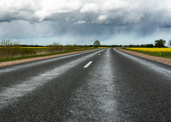 Road beatween fields.