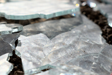 shattered glass close up with metal frame