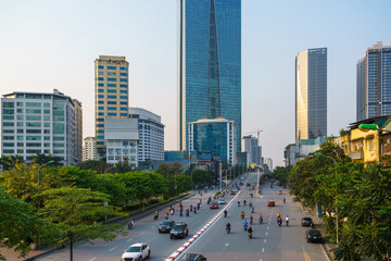 Hanoi cityscape with modern buildings on Nguyen Chi Thanh street at late evening