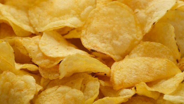 craft golden potato chips rotating close up