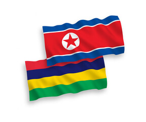 Flags of North Korea and Mauritius on a white background