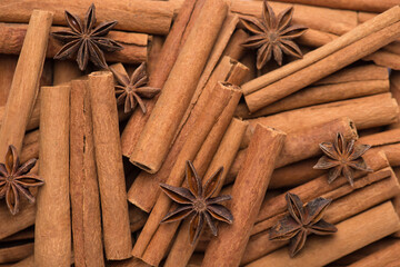 Photo of cinnamon sticks and anise stars macro background
