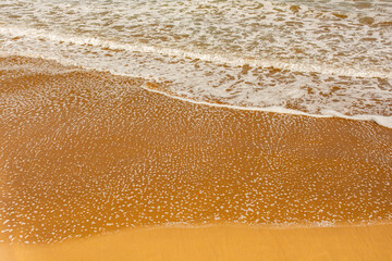 Sea waves up close with foam