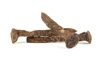 rusty big nails and iron plate on isolated on a white background