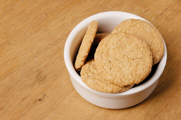 Stack of chip cookies on table