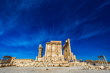 It's Temple of Bel , an ancient stone ruin located in Palmyra, Syria.
