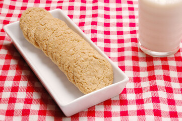 Cookies served at table and glass of milk