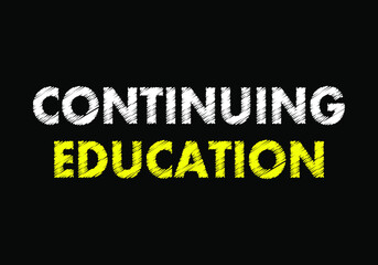 Continuing education writing text on black chalkboard. Education concept