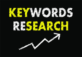 Keywords research writing text on black chalkboard. Technology concept