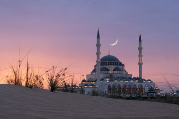 Sharjah Mosque at dusk is magnificent with its architecture and a beautiful mosque to visit especially during the month of Ramadan.
