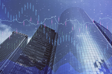 Forex chart on cityscape with skyscrapers wallpaper multi exposure. Financial research concept.
