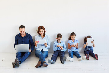 Large family with gadgets
