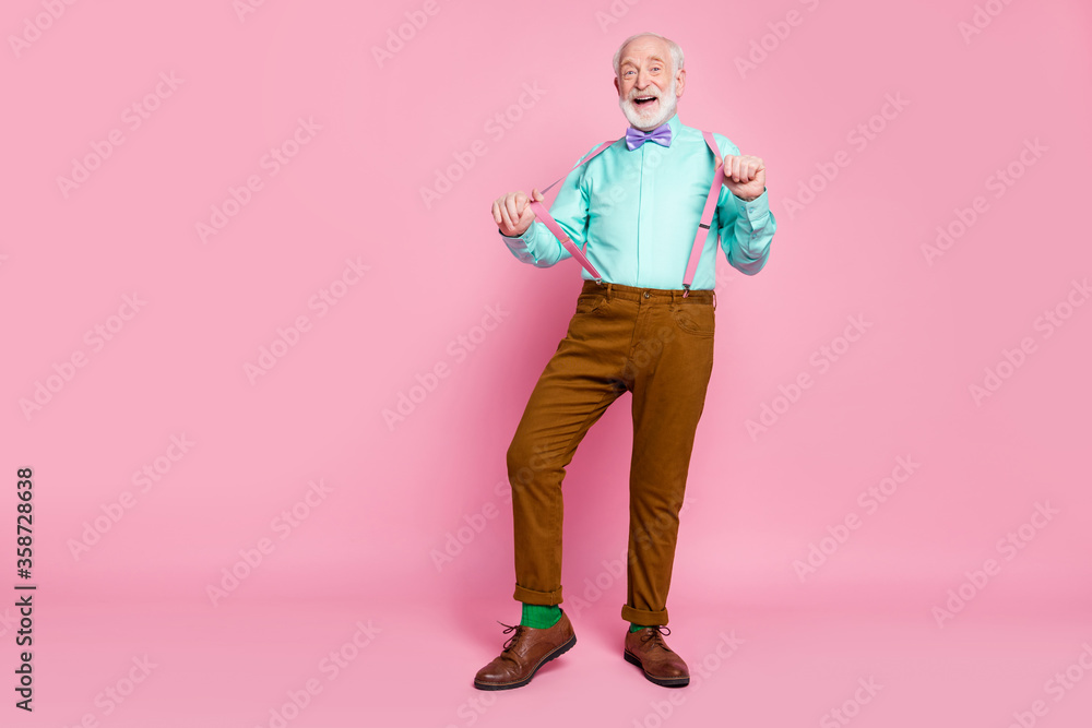 Sticker Full length photo of funny grandpa positive emotions senior party meeting touch hold fingers suspenders wear shirt violet bow tie brown pants shoes socks isolated pink pastel background