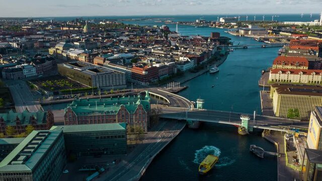 Timelapse shot orbiting around the city featuring the Knipplesboro bridge