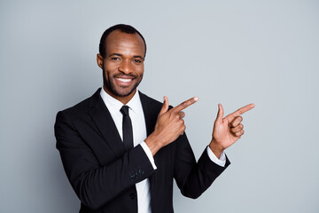 Close-up portrait of his he nice attractive imposing classy cheerful cheery glad guy recruiter showing copy space career development isolated over grey pastel color background