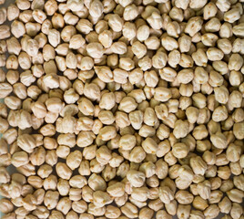 Plate of raw chickpeas filling the screen