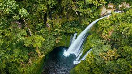 Aerial view of Tiu Kelep Waterfall Near Rinjani In Lombok Island, Indonesia