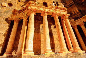 Columns of theRoman Theatre at Bosra, Syria. It was built in the second quarter of the 2nd century CE. - obrazy, fototapety, plakaty