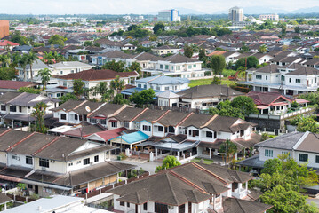Fototapeta na wymiar Kuching, Sarawak / Malaysia - December 18, 2019: Aerial view of Kuching housing residential area and development on daytime.