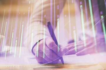Financial trading graph multi exposure with man desktop background.