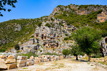 Fototapeta na wymiar It's Ancient rock cut tombs of the Lycian necropolis, Myra, Turkey