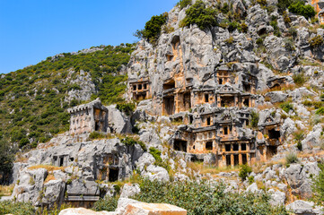 It's Ancient rock cut tombs of the Lycian necropolis, Myra, Turkey