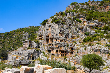 It's Ancient rock cut tombs of the Lycian necropolis, Myra, Turkey