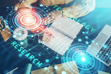 Double exposure of writing hands on background with data solution hologram on front. Technology concept. Close up