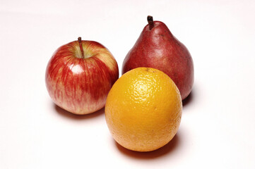 Pear, Apple and Orange, Close Up on white background .