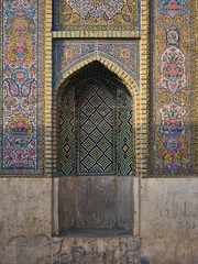 A beautifully decorated niche on the wall of a mosque in Shiraz.