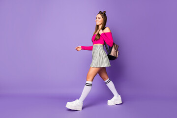 Full length body size view of her she nice attractive lovely pretty charming content cheerful cheery girl going to college isolated on bright vivid shine vibrant lilac violet purple color background