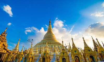 YANGON,MYANMAR-MAY 15.2020: Buddhist Pilgrims in the Shwedagon Pagoda at night. It is the most...