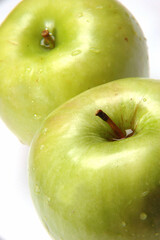 Stacked Apples on white background .