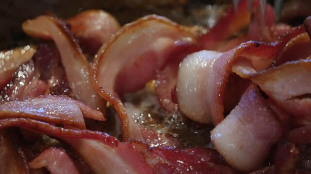 Frying bacon