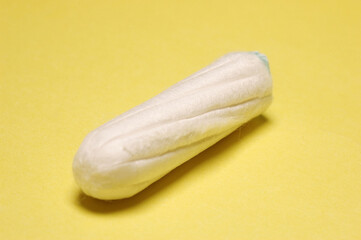Tampon, Close Up on yellow background