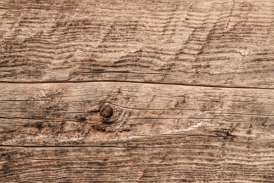 Hintergrund / Banner: Beige-braune Holz-Textur aus verwittertem Holz mit Astloch