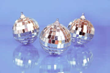 shiny toys balls on the Christmas tree for the a new year holiday