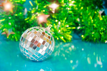 shiny toys balls on the Christmas tree for the a new year holiday