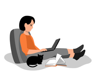 A woman works on a laptop from home.