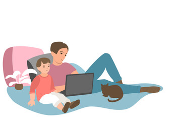 Dad and baby look at the laptop screen.