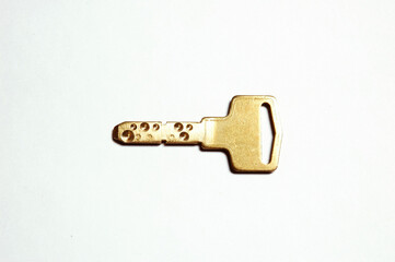 Close up of a Key on white background .
