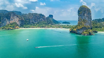 Railay beach in Thailand, Krabi province, aerial bird's view of tropical Railay and Pranang beaches with rocks and palm trees, coastline of Andaman sea from above 