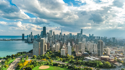 Fototapeta premium Chicago skyline aerial drone view from above, lake Michigan and city of Chicago downtown skyscrapers cityscape bird's view from park, Illinois, USA 
