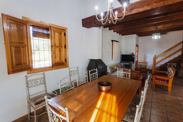Living room inside an old style rural rental house.