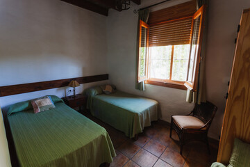 Bedroom inside an old-style rental cottage.