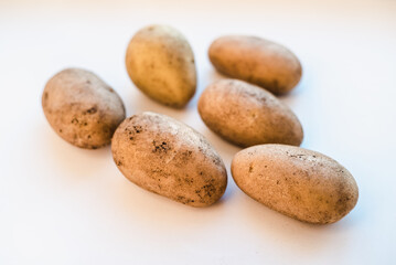 potatoes on white background, peeled potatoes on a white background