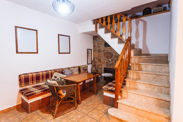 Living room inside an old style rural rental house.