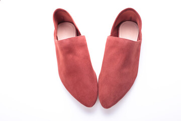 terracotta or peach loafers, modern casual women’s flat shoes, classic, suede mules and loafers, leather substitute, stylish on a white background, studio